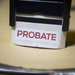 Probate stamp on a big folder of paperwork